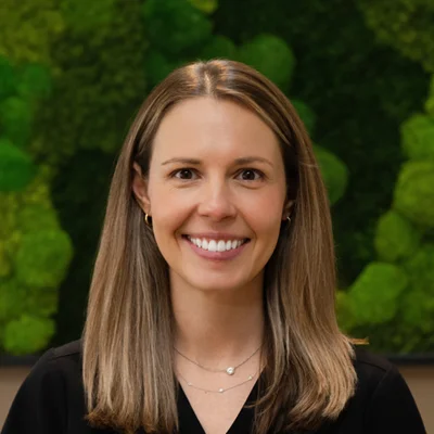 A headshot photo of dentist Alice Bassani